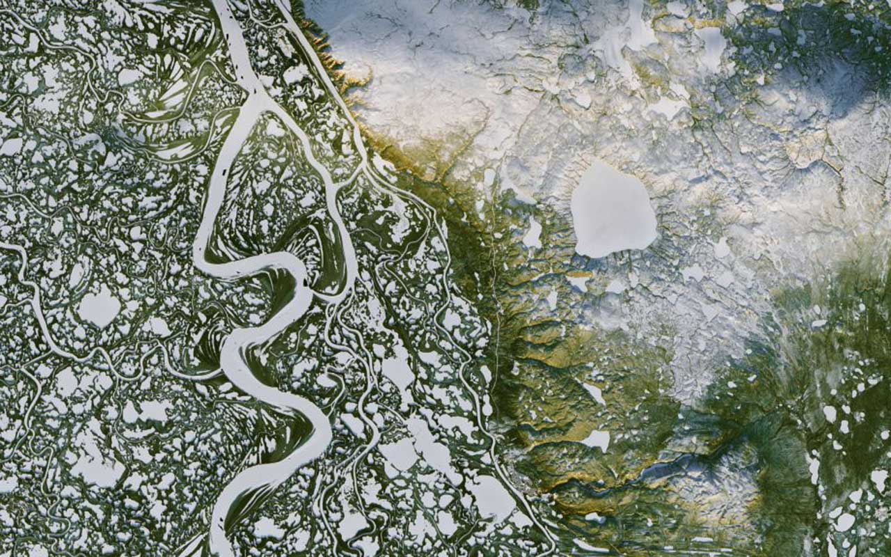 Accelerating carbon dioxide release from rocks in Arctic Canada with global warming