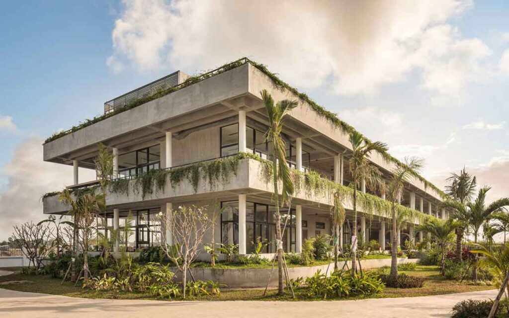 T3 Architects covers façade of coconut club in Cambodia with natural curtain made of plants