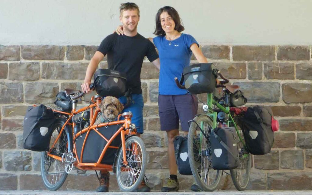 Two people, two bikes and a dog break world records in the name of sustainable mobility